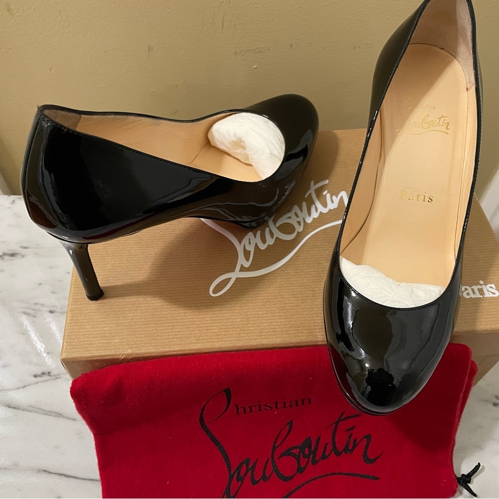 Christian Louboutin patent leather pumps brought in France